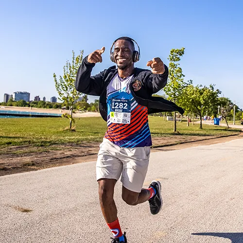 happy man running in headphones