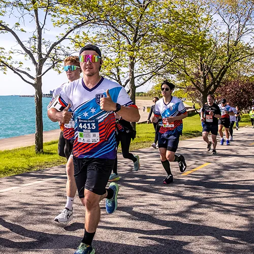 runners in swag thumbs up